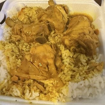 Uppa Yard - Curry chicken with white rice. - Caribbean Near Me - Milwaukee, Wisconsin