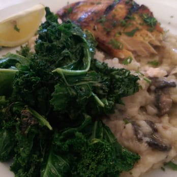 Grounds Restaurant - Salmon with mushroom risotto & kale. - New American Near Me - Murphys, California