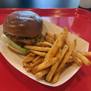 The Buffalo Spot - Classic Deluxe Chicken Sandwich with Garlic Parmesan Chicken, Lettuce, Tomato, and Pickles with Cajun Seasoned Fries - Chicken Wings Near Me - Irvine, California The Buffalo Spot - Classic Deluxe Chicken Sandwich with Garlic Parmesan Chicken, Lettuce, Tomato, and Pickles with Cajun Seasoned Fries - Chicken Wings Near Me - Irvine, California