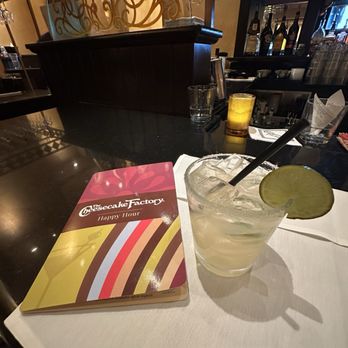The Cheesecake Factory - Happy Hour Menu Margarita in the rocks with salt. - Desserts Near Me - Orlando, Florida The Cheesecake Factory - Happy Hour Menu Margarita in the rocks with salt. - Desserts Near Me - Orlando, Florida