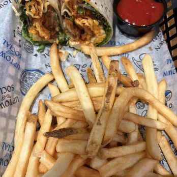 Uptown Social - Buffalo Chicken Wrap w/ side fries - Bars Near Me - Charleston, South Carolina Uptown Social - Buffalo Chicken Wrap w/ side fries - Bars Near Me - Charleston, South Carolina