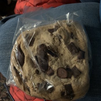 Sugar Mama's Bakeshoppe - This picture really doesn't do the cookie justice; I swear this thing could feed four people! - Bakeries Near Me - Suffolk, Virginia Sugar Mama's Bakeshoppe - This picture really doesn't do the cookie justice; I swear this thing could feed four people! - Bakeries Near Me - Suffolk, Virginia
