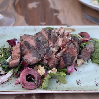 Straight Wharf Restaurant - a plate of steak and salad - New American Near Me - Nantucket, Massachusetts