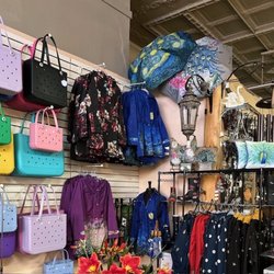 All That & More - Great selection of Bogg Bags, Rain Coats & Umbrellas. We have a Van Gogh Starry NIght rain coat and umbrella and it's raining cats and dogs