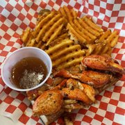 Photo of Bogart's Cafe - Honolulu, HI, United States. The AMAZING Lobster Roll (w/ browned butter) served with waffle fries ($30 - seems pricey, but totally worth it!)