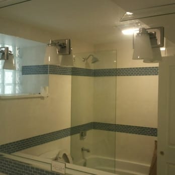 Karesh Glass - Clear mirror with four cut outs for lights and electrical outlet, Stationery Shower Panel - Home Decor Near Me - Bensenville, Illinois Karesh Glass - Clear mirror with four cut outs for lights and electrical outlet, Stationery Shower Panel - Home Decor Near Me - Bensenville, Illinois