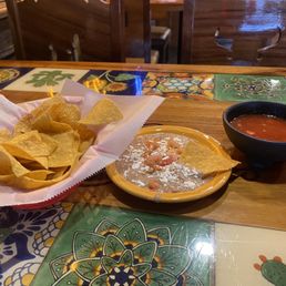 Complimentary chips and salsa and beans
