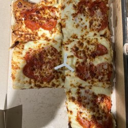 Pizza Hut - Detroit style pizza with sauce on the side. Wrong pepperoni used.