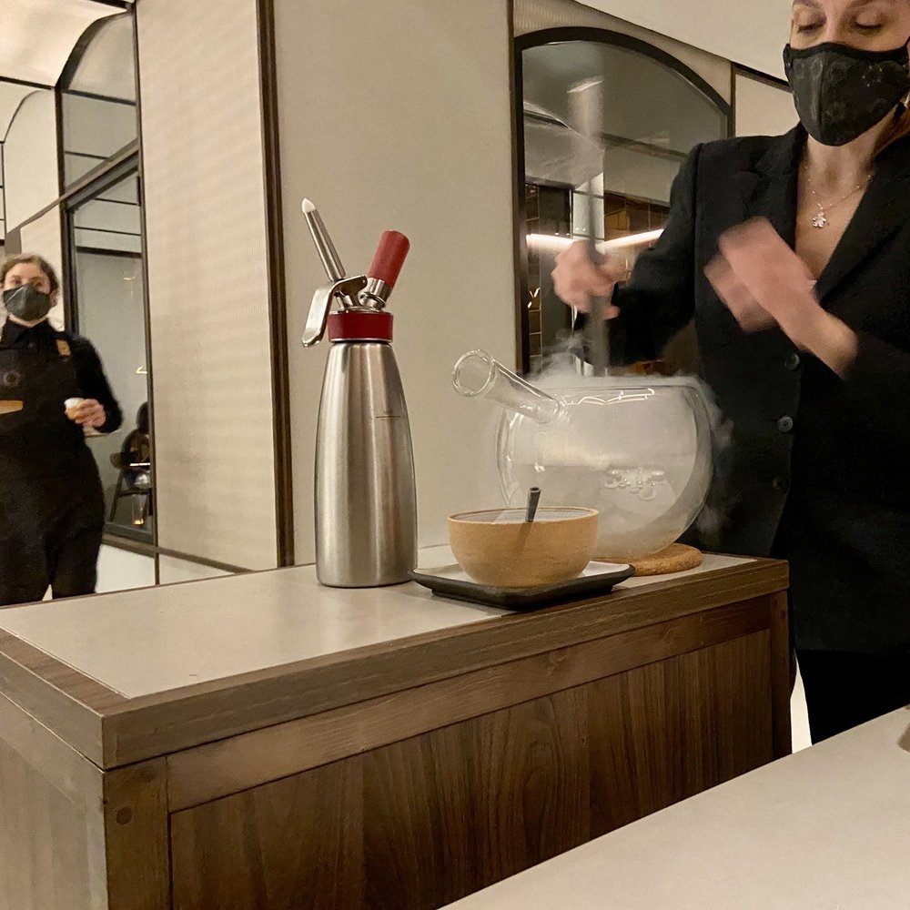 Cinc Sentits - Making the orange blossom nitro cream tableside - Catalan Near Me - Barcelona, B