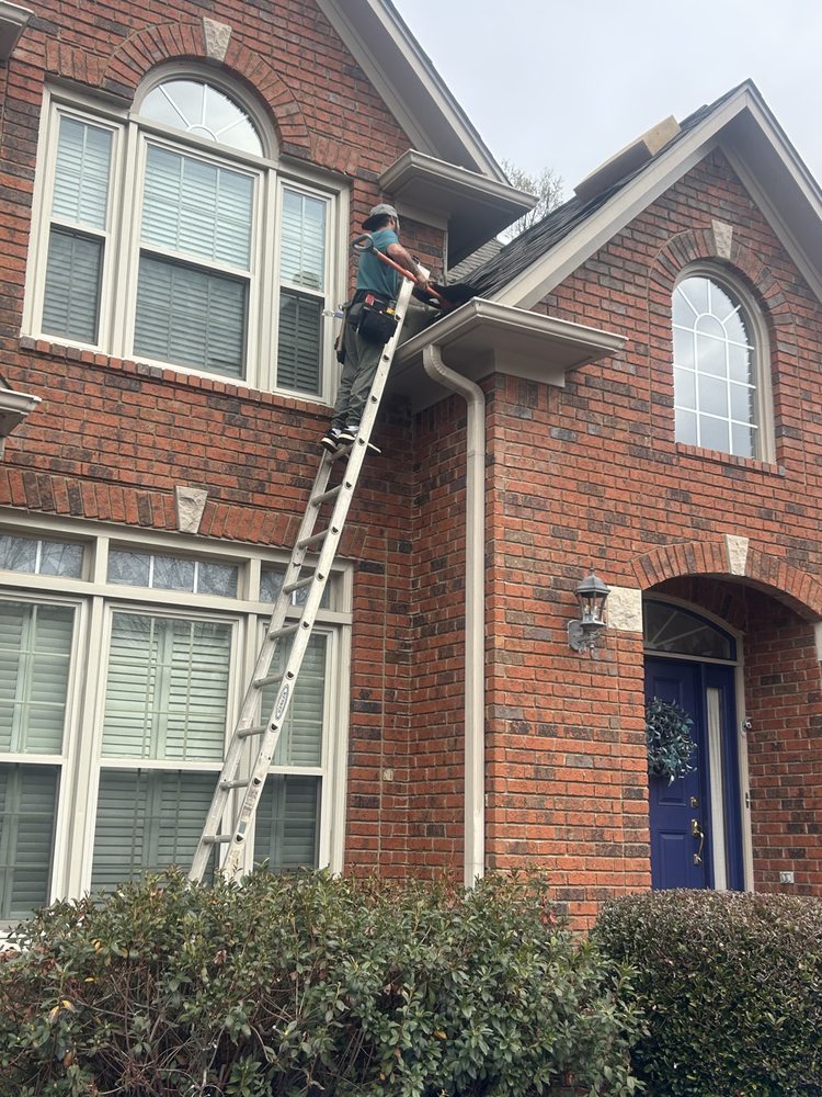 Slide of Dos Amigos Roofing