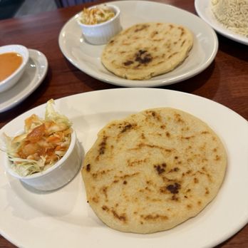 El Amate - Pork and cheese + chicken and cheese pupusas. - Salvadoran Near Me - Palm Bay, Florida