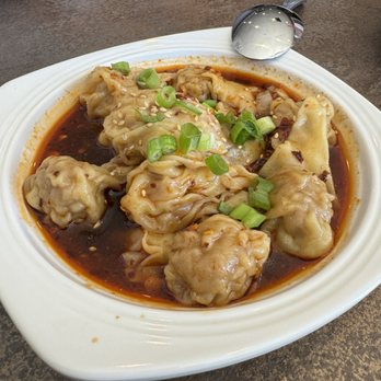 A Table Wayne's Kitchen - Chili oil pork dumplings - Asian Fusion Near Me - Manteca, California