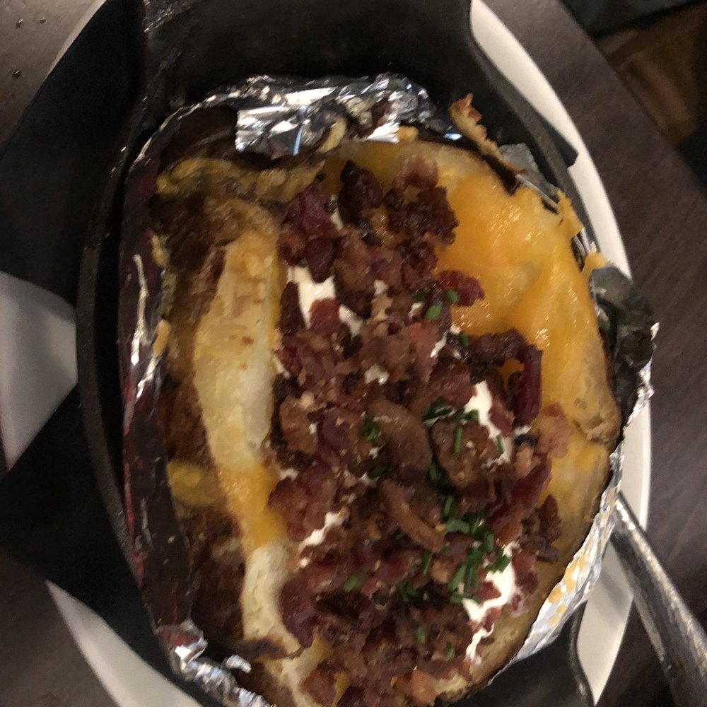 Bottles & Bones - Baked potato the size of Idaho - Bars Near Me - Suwanee, Georgia