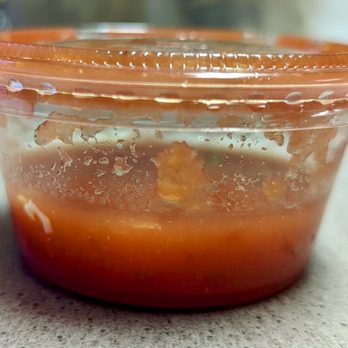 Dos Reales Authentic Mexican Restaurant - sauce in a plastic container - Mexican Near Me - Overland Park, Kansas Dos Reales Authentic Mexican Restaurant - sauce in a plastic container - Mexican Near Me - Overland Park, Kansas
