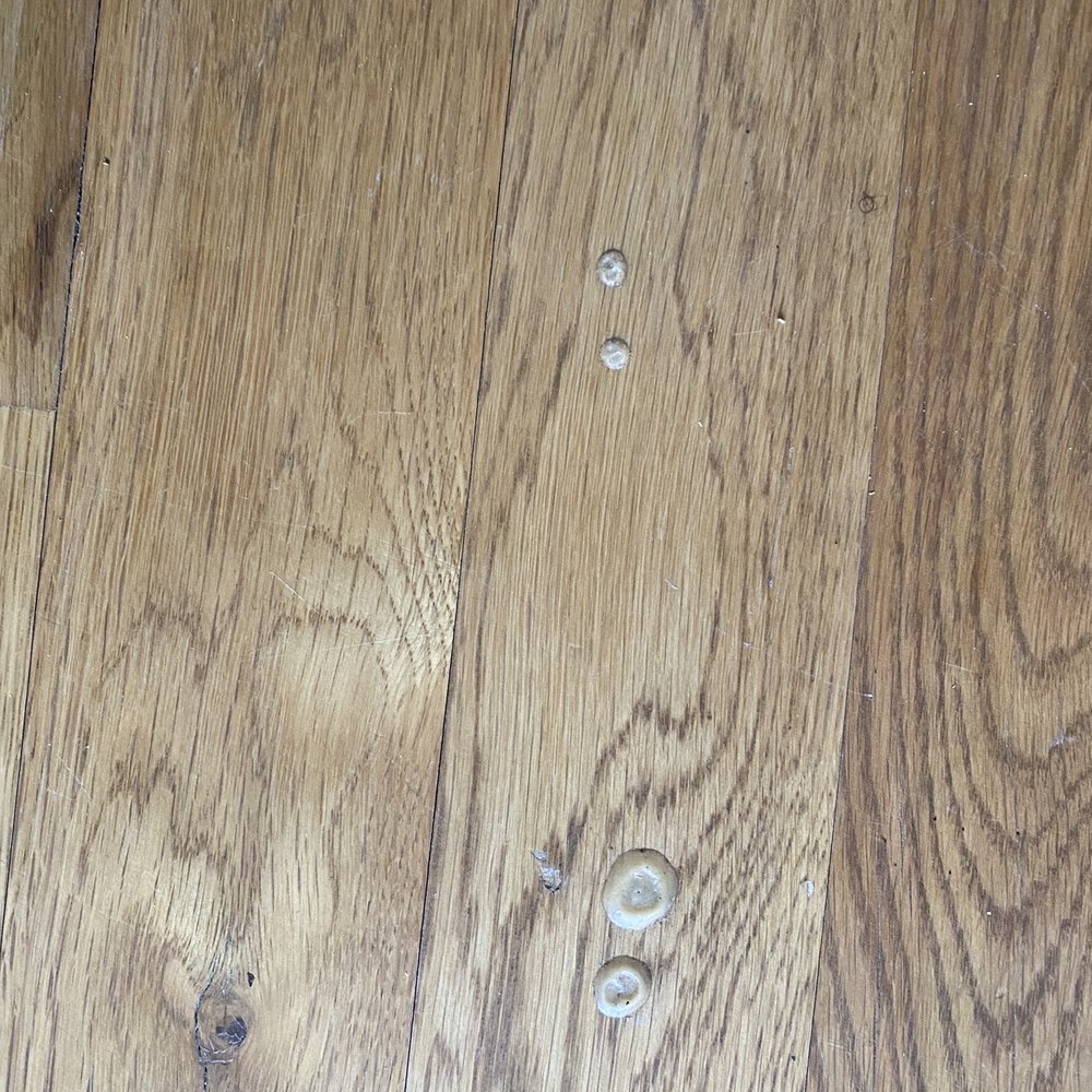 AMH - Some sort of wax or goo on dining room floors - Property Management Near Me - Norcross, Georgia