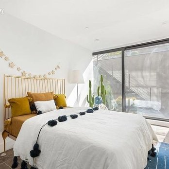 NJE Luxury - a bedroom with a large bed - General Contractors Near Me - Franklin Square, New York NJE Luxury - a bedroom with a large bed - General Contractors Near Me - Franklin Square, New York