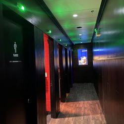 Greta - The green light above the stall indicate it's available to use. Washrooms.