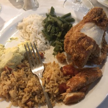 Dooky Chase's Restaurant - Lunch buffet. Fried Chicken, green String Beans, jambalaya, white rice, potato salad, stew fish in tomato sauce i believe. - Cajun/Creole Near Me - New Orleans, Louisiana