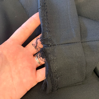 Robert's Men Suits & Custom Tailoring - Raw hem and sloppy stitching on pant cuff - Sewing & Alterations Near Me - San Diego, California