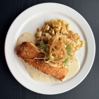 Corner Kitchen - Salmon and Spatzle, Creamy Lemon Dill Sauce topped with Haystack Onions - Diners Near Me - New Lisbon, Wisconsin