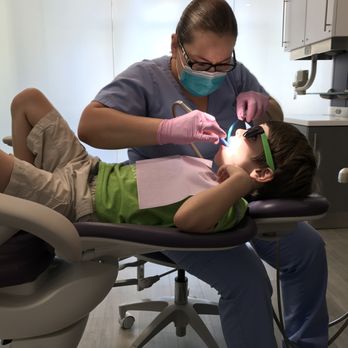 Sunshine Pediatric Dentistry - Here's my little man watching Toy Story 3 on a flat screen on the ceiling & enjoying his chocolate toothpaste! First time he's been willing! - Pediatric Dentists Near Me - Yorba Linda, California Sunshine Pediatric Dentistry - Here's my little man watching Toy Story 3 on a flat screen on the ceiling & enjoying his chocolate toothpaste! First time he's been willing! - Pediatric Dentists Near Me - Yorba Linda, California