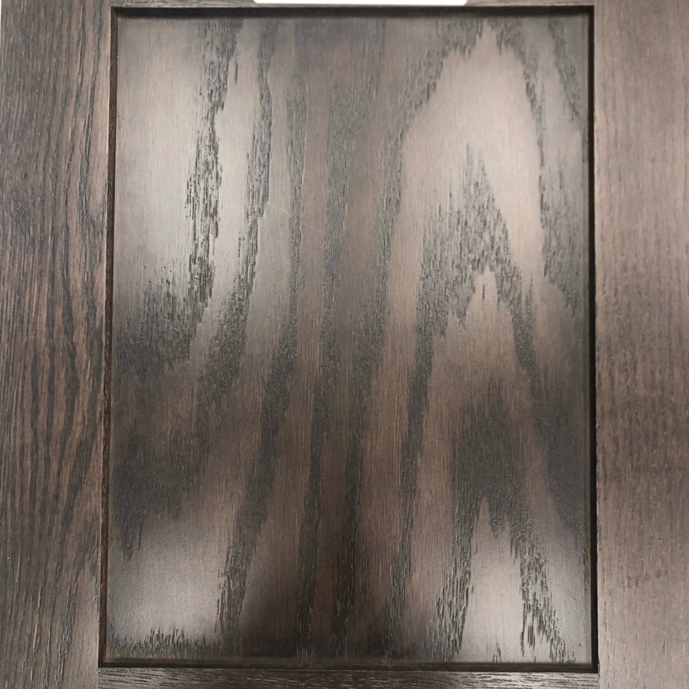 Greenstone - CHOSEN black cabinet sample inside/backside view with label (Aug 2023) - Home Developers Near Me - Liberty Lake, Washington Greenstone - CHOSEN black cabinet sample inside/backside view with label (Aug 2023) - Home Developers Near Me - Liberty Lake, Washington