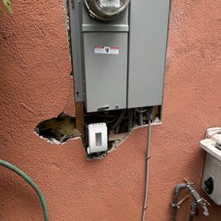 Cal Express Patching - One area requiring repair and patching around the new electric service panel