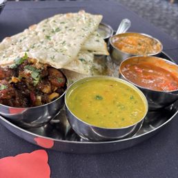 Chicken thali with garlic naan.