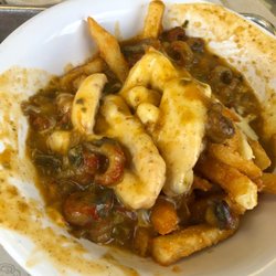 Off The Hook - Swamp fries. Topped with pepper jack cheese and crawfish Étouffée