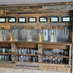 Latitude 42 Taphouse - Wall of different taps