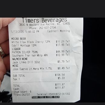 Timers Beverage Center - a person holding a receipt - Beer, Wine & Spirits Near Me - Racine, Wisconsin Timers Beverage Center - a person holding a receipt - Beer, Wine & Spirits Near Me - Racine, Wisconsin