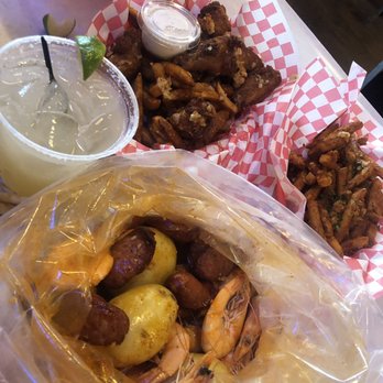Stinkin Crawfish - Margarita, CWings & Fries, 1/2 lbs white shrimps Stinkin' Special Medium Spicy with potato and Sausages - Cajun/Creole Near Me - West Covina, California Stinkin Crawfish - Margarita, CWings & Fries, 1/2 lbs white shrimps Stinkin' Special Medium Spicy with potato and Sausages - Cajun/Creole Near Me - West Covina, California