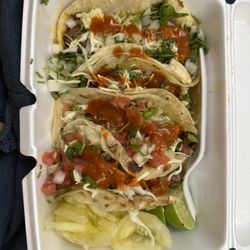 Dona Alicia Mexican Food - Corn birria taco, flour birria taco, flour chicharron taco, and flour asada taco. Not shown: red and green sauces.