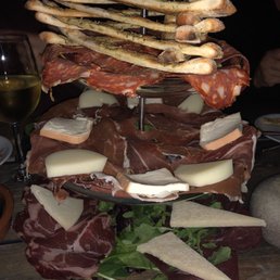 This is the tower of deliciousness. Four types of meat, 3 types of cheese and housemade bread. This is the tower of deliciousness. Four types of meat, 3 types of cheese and housemade bread.