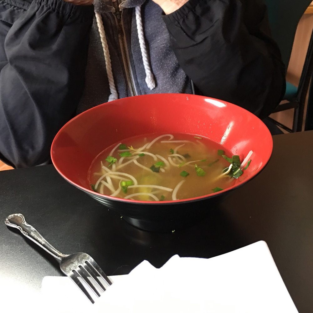 Fresh Rolls - a woman eating a bowl of soup - Vietnamese Near Me - Gig Harbor, Washington Fresh Rolls - a woman eating a bowl of soup - Vietnamese Near Me - Gig Harbor, Washington