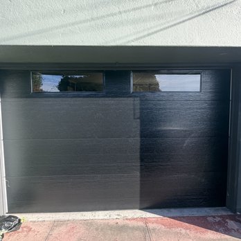 Skyline Garage Doors - Black flush panel with Windows garage door - Garage Door Services Near Me Skyline Garage Doors - Black flush panel with Windows garage door - Garage Door Services Near Me