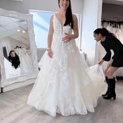 Clarice's Bridal - Molly was very attentive to details, helped dress & undress for 5 minutes record between styles & provided details on train options & veils