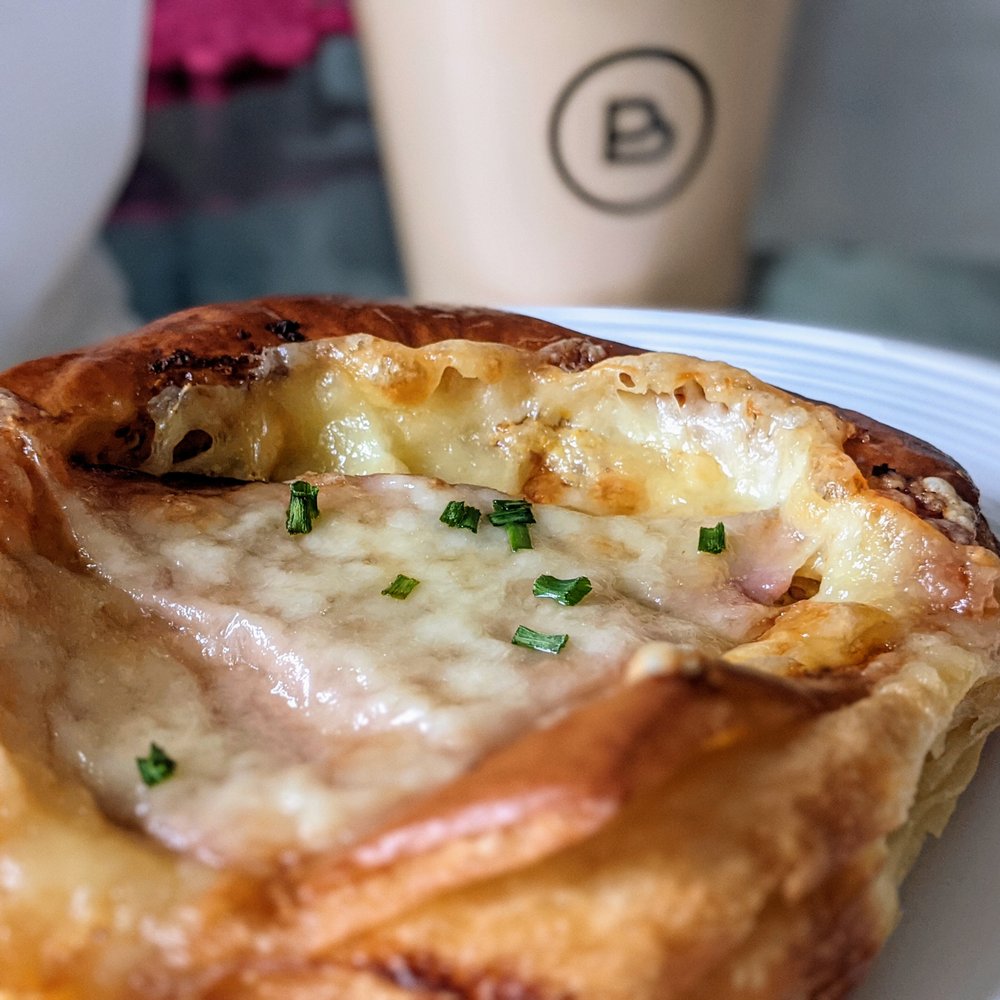 Le Beau - ham and cheese, and a cappucino. - Patisserie/Cake Shop Near Me - Toronto, Ontario