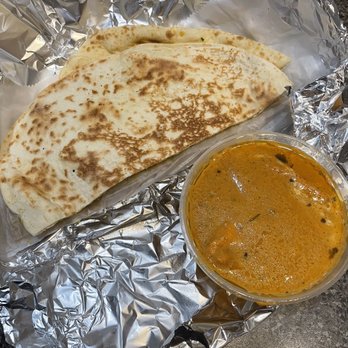 Haldi Indian Cuisine - Chicken Butter Masala Roti Garlic Naan - Indian Near Me - Surprise, Arizona Haldi Indian Cuisine - Chicken Butter Masala Roti Garlic Naan - Indian Near Me - Surprise, Arizona