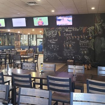321 Lime House - The stage and more tables. - Beer Bar Near Me - Cape Canaveral, Florida