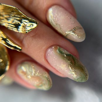 Rikita Nails - Soft marble nail art with delicate green and gold details, creating an elegant, natural stone-inspired look. - Nail Technicians Near Me - Agoura Hills, California Rikita Nails - Soft marble nail art with delicate green and gold details, creating an elegant, natural stone-inspired look. - Nail Technicians Near Me - Agoura Hills, California