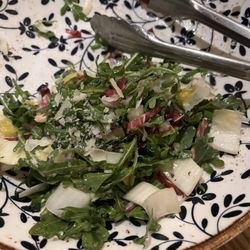 Remains of  Salad. We had the tricolor and arugula and artichoke salad. Delicious!