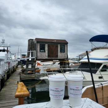 Springline Coffee - two cups of coffee on a dock - Coffee & Tea Near Me - Newport, Rhode Island