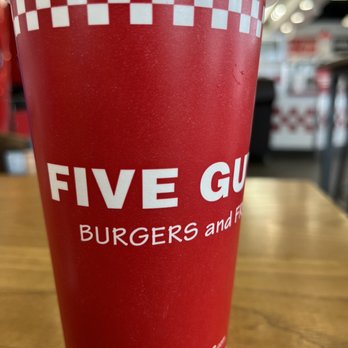 Five Guys - a red cup on a table - Burgers Near Me - Woodhaven, Michigan
