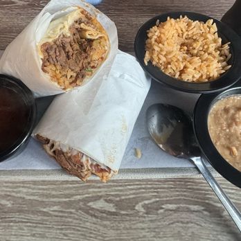 Dos Amigos Birrieria - Birria Burrito Combo with my spoon, had to take a bite out of the beans first lol - Mexican Near Me - Montclair, California Dos Amigos Birrieria - Birria Burrito Combo with my spoon, had to take a bite out of the beans first lol - Mexican Near Me - Montclair, California