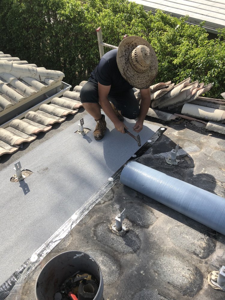 Slide of V & A Roofing