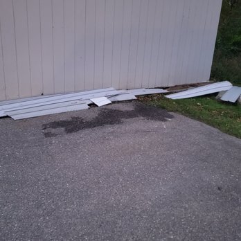 Oakbrooke Apartments - Siding that has been blowing around for years - Apartments Near Me - Howell, Michigan Oakbrooke Apartments - Siding that has been blowing around for years - Apartments Near Me - Howell, Michigan