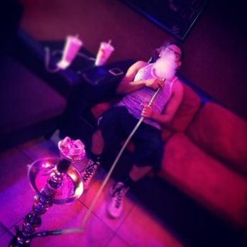 Hookah Zone & Vape Lounge - a woman smoking a hookah - Hookah Bars Near Me - San Jacinto, California Hookah Zone & Vape Lounge - a woman smoking a hookah - Hookah Bars Near Me - San Jacinto, California