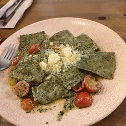 Tucco Real Food Born - Ravioli with pesto sauce and cherry tomatoes.  Ravioli had a cheese filling. Very good dish.