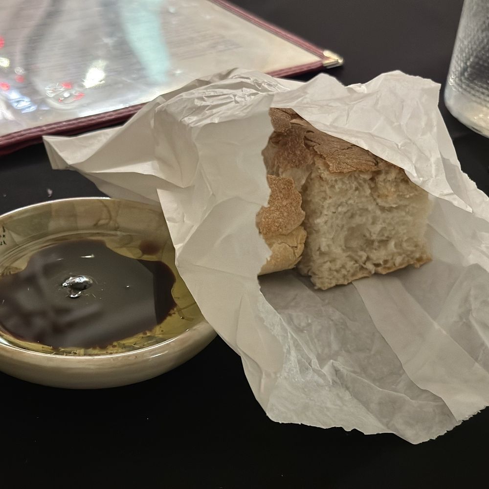 Amore Mio Italian Bistro - Sourdough Bread with Oil and Vinegar - Italian Near Me - Placerville, California Amore Mio Italian Bistro - Sourdough Bread with Oil and Vinegar - Italian Near Me - Placerville, California